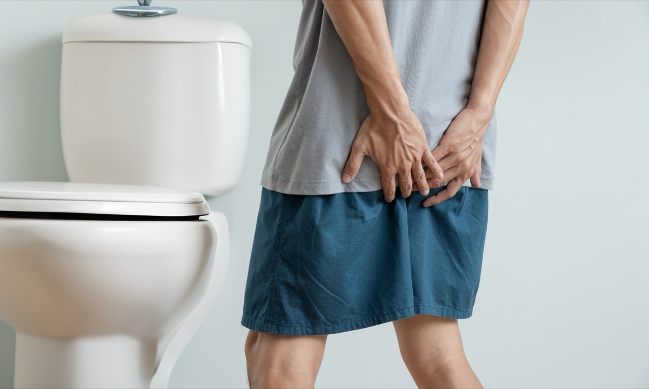 Man suffering from blood in his stool
